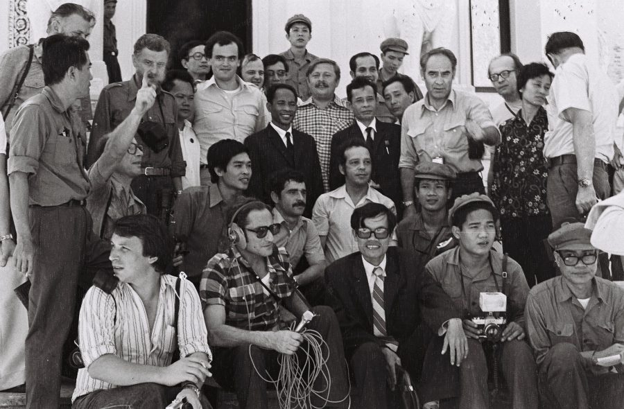 A group of people posing for a group photograph