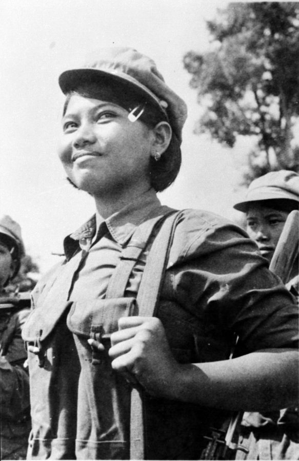 A smiling female soldier in uniform