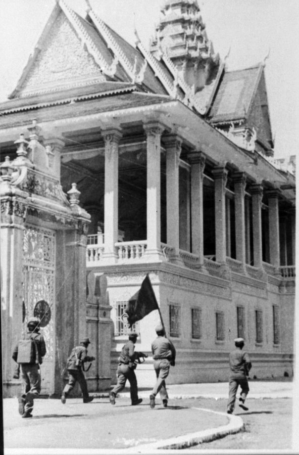 Armed soldiers outside a palace
