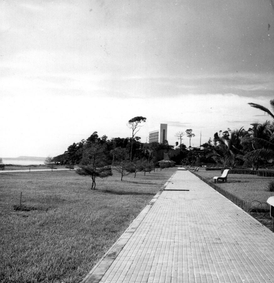 Tall buildings next to a beachside park